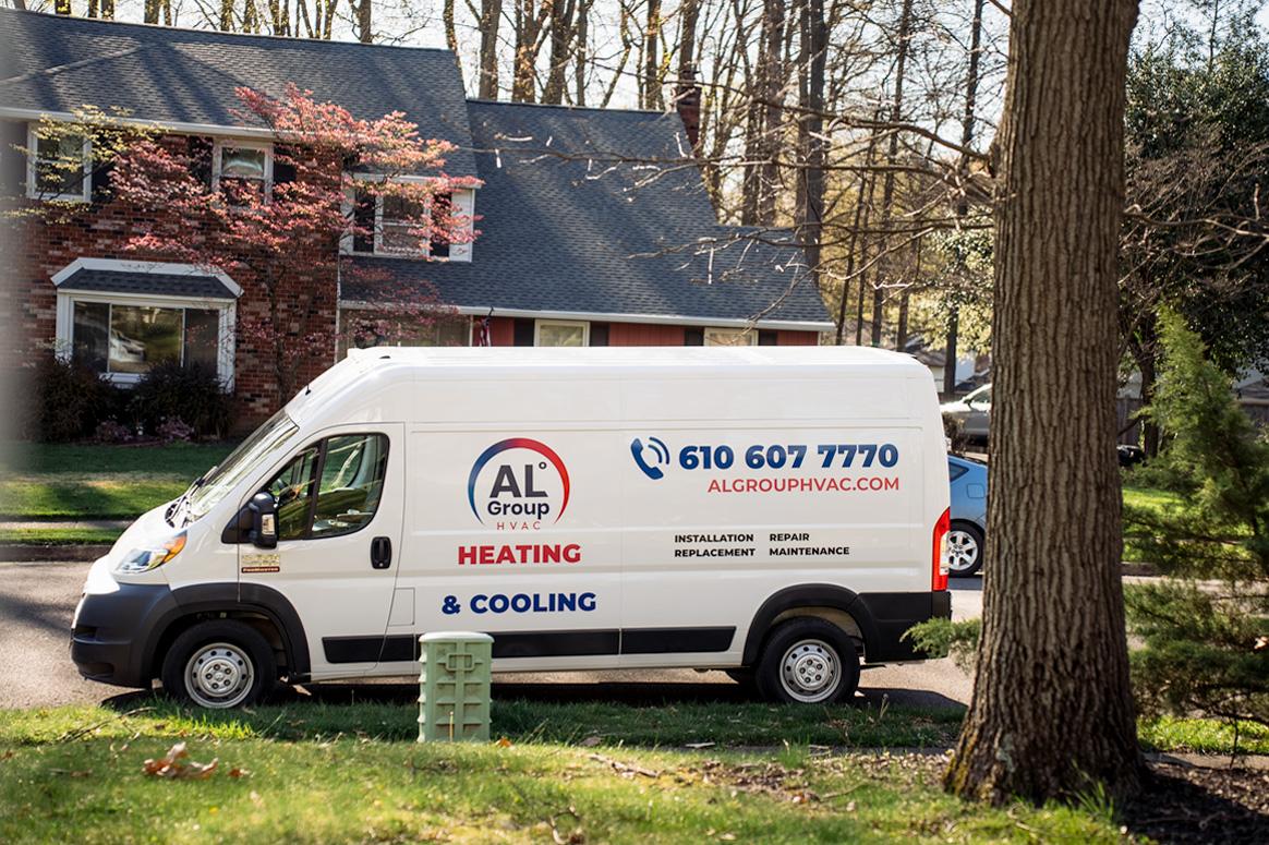 van in front of a customer's house